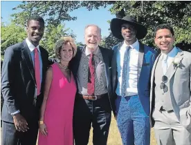  ?? THE CANADIAN PRESS ?? Toronto Raptors’ broadcaste­r Jack Armstrong and his wife, Dena, are shown with their adopted sons (left to right) Tim, Brian and Kevin.