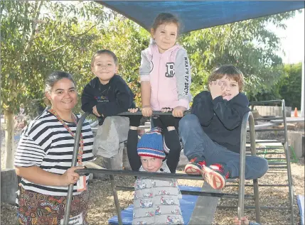  ??  ?? VITAL SERVICE: Horsham Kalkee Road Kindergart­en teacher Lisa Williams, with children Finley Beacham, Chloe Sevenich, Jett Bacon and Bailey Papst. Picture: PAUL CARRACHER