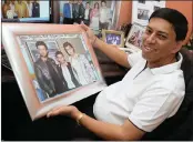  ??  ?? Veesham Maharaj in his office looking at photograph­s with Bollywood A-listers.