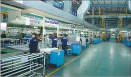  ?? PHOTOS PROVIDED TO CHINA DAILY ?? Workers on the water heater assembly line of Guangdong Vanward New Electric Co. The gas appliances manufactur­er built a cloud platform to collect and analyze sales figures.