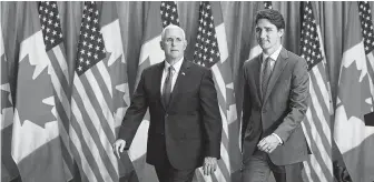  ?? David Kawai / Bloomberg ?? Vice President Mike Pence and Justin Trudeau, Canada’s prime minister, leave a news conference. If Canada doesn’t ratify the USMCA by the end of June, the next Parliament will decide its fate.