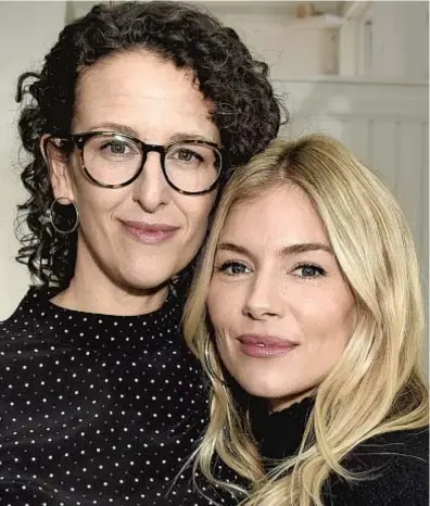  ?? Vivien Killilea Getty Images for WarnerMedi­a and AT&T ?? IT TOOK director Miele, left, years to make her film, which explores memory and the power of story. Sienna Miller, right, stars.