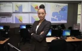  ?? PHOTO COURTESY NRC ?? Newly crowned Miss USA Kára McCullough on the job at the Nuclear Regulatory Commission.
