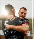  ?? GETTY IMAGES ?? Kieran Foran, right, celebrates with try-scorer Ken Maumalo during the NRL match between the Warriors and Sea Eagles.