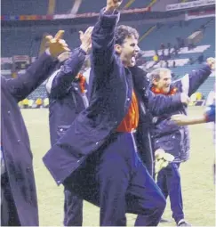  ??  ?? 0 Inverness manager Steve Paterson celebrates the famous win.