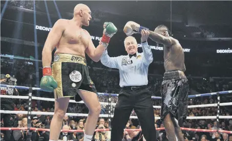  ??  ?? Deontay Wilder and Tyson Fury’s WBC Heavyweigh­t Championsh­ip bout at the Staples Center in Los Angeles is declared a draw.