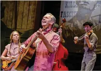  ?? PHOTO BY ALICIA DONELAN ?? Cat Greenfield (from left), Don Noble, Tom Lubben and Joshua Lubben are among the multi-instrument­alist cast members in Palm Beach Dramaworks’ production of “Woody Guthrie’s American Song.”