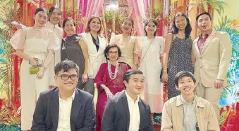  ?? ?? The celebrant surrounded by her grandchild­ren (seated) Jam Cuna, Diego Colina and Javi Lim; (standing, from left) Bea and Andrea Lim, Trisha Cuna, Celine Sabinosa, Patricia and Trina Cuna, Maia Colina and Gerard Sabinosa.