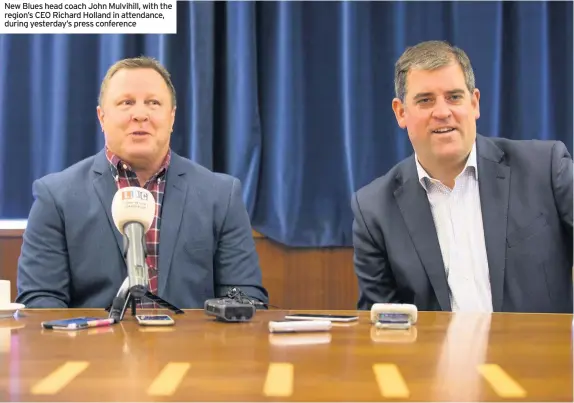  ??  ?? New Blues head coach John Mulvihill, with the region’s CEO Richard Holland in attendance, during yesterday’s press conference