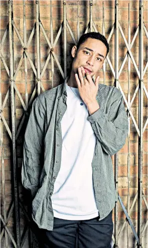  ??  ?? New music: Loyle is tipped for success with his debut album, Yesterday’s Gone. Left, performing in his stepfather’s Manchester United shirt at Isle of Wight