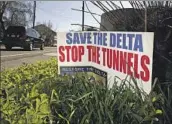  ?? Rich Pedroncell­i Associated Press ?? A YARD SIGN in Freeport, Calif., in 2016 opposes an earlier tunnel proposal under then-Gov. Jerry Brown.