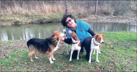  ??  ?? Left: Regional Animal Wellness (R.A.W.) owner Jeannette Colombo spends a little time outside her facility with her three dogs. From left: Miah Emilia, 14, Ethel Riley, 2, and Elwood Blues, seven months. (Catoosa News photo/ Adam Cook)