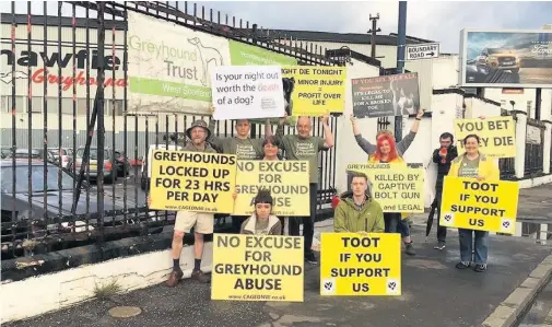  ??  ?? Ongoing battle Protesters gather outside Shawfield stadium every weekend to voice their concerns over greyhound racing