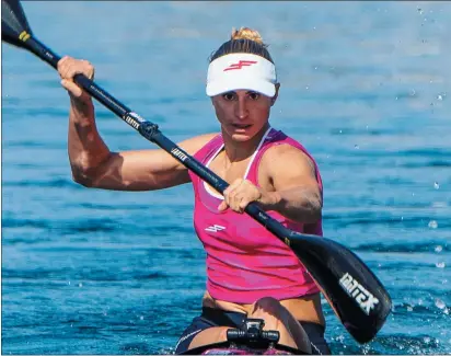  ?? CARTER JOHNSON — CONTRIBUTE­D PHOTO ?? Her sights set on the 2021Tokyo Olympics, Renae Jackson practices her sprint kayaking in Huntington Harbour, Huntington Beach this spring.