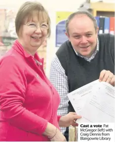  ??  ?? Cast a vote Pat McGregor (left) with Craig Dennis from Blairgowri­e Library