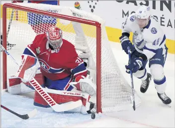  ?? RYAN REMIORZ — THE CANADIAN PRESS VIA AP ?? Montreal goaltender Carey Price will try to keep Ondrej Palat and Tampa Bay from clinching the Stanley Cup title tonight.