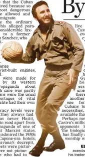  ??  ?? ELITE: Castro exercises in 1963 in his trademark fatigues