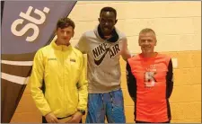  ??  ?? The podium at the Dromiskin 5k had an internatio­nal flavour, with winner Freddy Sittuk flanked by Valdas Dopolskas and Shane Healy.