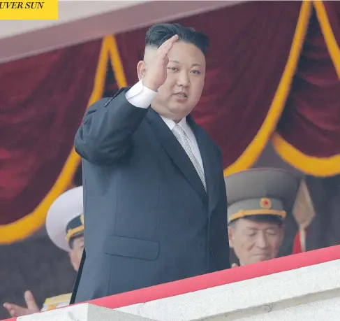  ?? WONG MAYE-E / THE ASSOCIATED PRESS FILES ?? North Korean leader Kim Jong Un waves during a military parade in Pyongyang, North Korea, in April. The rogue northeast Asian country has reacted strongly against tough new UN sanctions, vowing to continue weapons tests that it says could be used to...