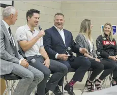  ?? DEREK RUTTAN ?? San Jose Sharks forward Logan Couture, second from left, speaks during a panel on concussion­s on Wednesday as part of a conference at Western University in London, Ont. Also on the panel are hockey broadcaste­r Ron MacLean, former NHL player Eric...