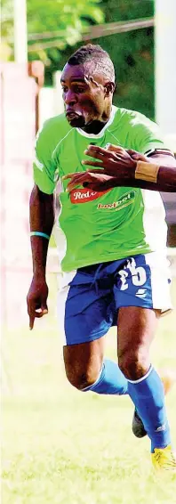  ?? SHORN HECTOR ?? Boys Town FC’s Shaquille Bradford tries to prevent Dwayne Ambusley (left) gaining possession during a Red Stripe Premier League match at the Barbican Stadium on Sunday, January 28, 2018.