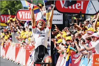  ?? (AFP) ?? Germany’s John Degenkolb celebrates as he crosses the finish line to win the ninth stage of the 105th edition of
the Tour de France cycling race between Arras and Roubaix, northern France, on July 15.