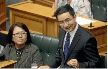  ?? PHOTO: KEVIN STENT/STUFF ?? Two-term National list MP Jian Yang gives his maiden speech in Parliament. He has been caught up in awkward questions about links to spying.