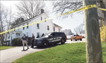  ?? Arnold Gold / Hearst Connecticu­t Media ?? Branford Police on Wednesday investigat­e a home at 241 Main St., where they engaged fire with a shooter in a second-floor apartment the previous day.