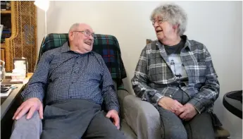  ?? CITIZEN PHOTO BY JAMES DOYLE ?? Ted Christian, left, and his wife, Bertha, share a smile as they talk last week about their past. Ted has Parkinson’s disease and the two shared stories of what it is like living with the disease.