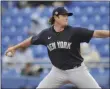  ?? STEVE NESIUS - THE ASSOCIATED PRESS ?? New York Yankees starter Gerrit Cole pitches against the Toronto Blue Jays during the third inning of a spring training baseball game Sunday, March 21, 2021, at TD Ballpark in Dunedin, Fla.