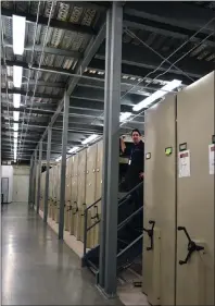  ?? SUBMITTED PHOTO ?? Facility worker Daniel Meller is seen cleaning in the Collection­s area.