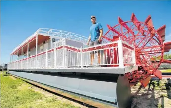  ?? PHOTOS BY JOE BURBANK/ORLANDO SENTINEL ?? When it launches, the 80-foot Dora Queen steamboat will be a far larger boat than it was when Brian Herron purchased it more than two years ago. Plans call for daily cruises as well as private events for companies, weddings and parties.