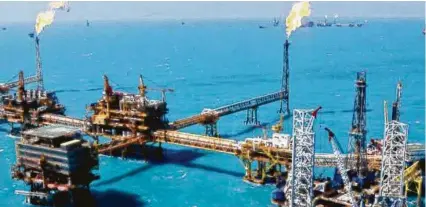  ?? Courtesy ?? A Pemex platform in the Gulf of Mexico. Mexico’s energy reforms still favor the state-owned oil company, the author notes.