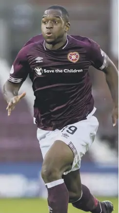  ??  ?? 0 John Souttar, left, and Uche Ikpeazu now join Christophe Berra on Hearts’ injured list.