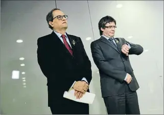  ?? SEAN GALLUP / GETTY ?? Torra y Puigdemont durante su encuentro posterior a la investidur­a