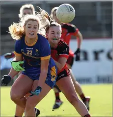  ??  ?? Wicklow’s Sarah Miley is challenged by Cliodhna Doherty of Down.