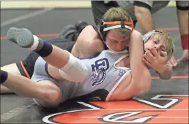  ?? Scott Herpst ?? Lafayette’s Avery Sullivan goes for back points against Gordon Lee’s Zane Murdock during Thursday’s matches. Sullivan, along with teammate Karson Ledford, won an individual title at the Gorilla Warfare Tournament at Berkmar High School over the weekend.