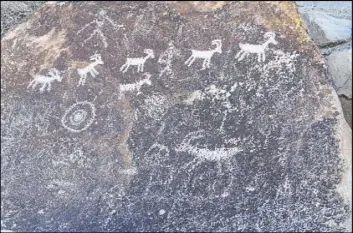  ??  ?? This petroglyph panel of bighorn sheep can be found in Grapevine Canyon in the Lake Mead National Recreation Area.