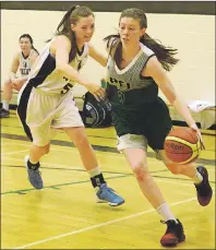  ?? JASON MALLOY/THE GUARDIAN ?? Team P.E.I.’s Lexi MacInnis, right, drives to the paint during the Red Rock Classic basketball tournament in June in Charlottet­own.