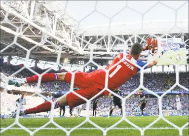  ?? Ryan Pierse / Getty Images ?? Iceland’s Hannes Halldorsso­n saves a penalty kick from Lionel Messi of Argentina during their group D match at the World Cup on Saturday.