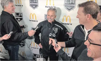  ?? GREG BEACHAM
THE ASSOCIATED PRESS ?? Los Angeles Kings interim coach Willie Desjardins takes questions from reporters after his first practice with his new team on Monday.