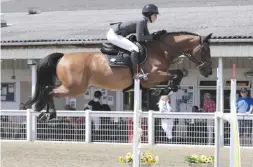  ??  ?? Sophie Gracida and ‘quirky’ Diamant WP Z land the 1.25m jump-off