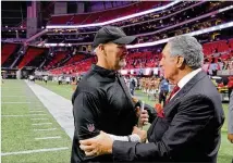  ??  ?? Falcons owner Arthur Blank greets coach DanQuinn after Saturday’s game, which served as a fifirst look atMercedes-Benz Stadium. The offifficia­l opening ceremonies­will comein the regular season.