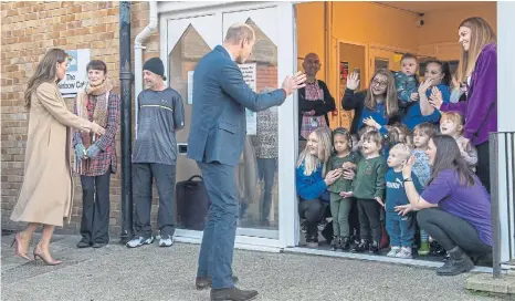  ?? Photos on this page by Bruce Rollinson ?? A wave for the children and staff of Mucktubs Nursery as the Prince and Princess of Wales leave the centre.