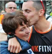  ?? BELOW: ?? RIGHT: Shane Finn hugs his mother, Josie, at the finishing line in Dingle
Shane Finn at the finishing line in Dingle with his cousin Mary who inspired him to run 24 marathons in 24 days to raise funds for SBHI.