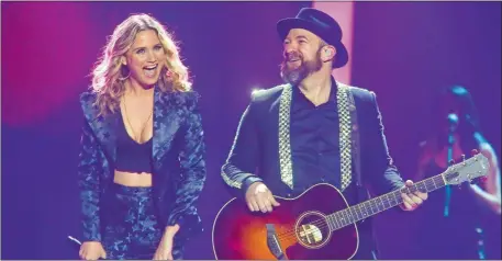  ?? JACK PLUNKETT/INVISION/AP, FILE ?? Jennifer Nettles, left, and Kristian Bush of Sugarland perform in May at the iHeartCoun­try Festival in Austin, Texas.