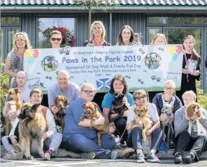  ??  ?? Taking a lead Some of the pets who will be turning out to help the Lanarkshir­e hospice