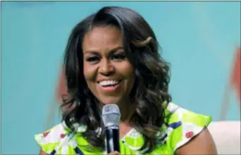  ?? GERALD HERBERT — THE ASSOCIATED PRESS ?? In this file photo, former first lady Michelle Obama speaks at the American Library Associatio­n annual conference in New Orleans.