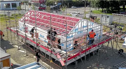  ?? ?? Great progress being made on the first day of the 60-hour build of a house to be sold for the mental health charity I Am Hope.