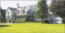  ?? Stanley Jesudowich / Contribute­d photo ?? The custom clapboard-and-stone colonial house at 499 Silvermine Road in New Canaan sits on two acres, has a wealth of amenities for indoor-outdoor living and is listed at $3.85 million.